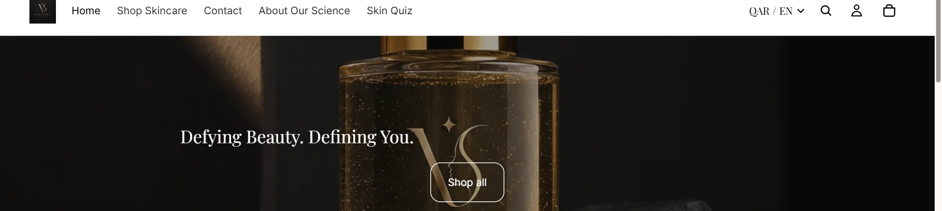Vellora Cosmetics Shopify storefront homepage with the hero headline 'Defying Beauty. Defining You.' and a Shop all button